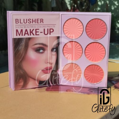 Mocallure 5 Step Make-up blusher palette with six shades on a reflective surface, featuring a model's face on the packaging.
