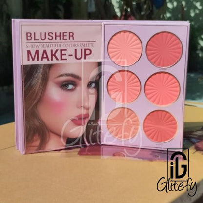 Mocallure 5 Step Make-up blusher palette with six shades on a reflective surface, featuring a model's face on the packaging.